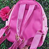 MOCHILA JUICY CINTA ROSADA