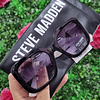 LENTES STEVE MADDEN NEGROS PATILLAS BLANCAS