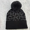 GORRO GUESS NEGRO LETRA G