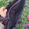 TOTE TOMMY NEGRO LISO 1 CIERRE AFUERA