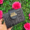 BILLETERA STEVE MADDEN NEGRA BROCHE