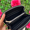 TARJETERO STEVE MADDEN NEGRO MONOGRAMO OVALADO