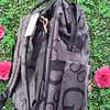PAÑALERA GUESS NEGRA LOGOS G