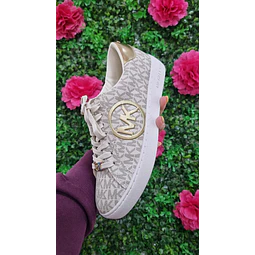 ZAPATILLA MK VAINILLA NRO7 DETALLE CIRCULO MK DORADO