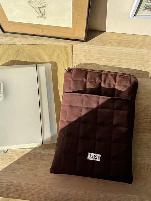 funda laptop/ipad café