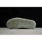 Jordan retro 4 x Kaws gris 3