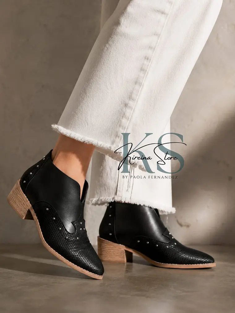 CAMPERO BLACK TACHAS 1