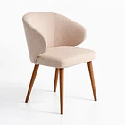 Silla Aura Tapizada en Tela Beige con Patas de Madera 1