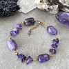 Pulsera de mujer con Amatistas y acero dorado 1