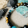 Pulsera unisex confeccionada con Ojo de Tigre, Ágatas Azules y Ónix Negro Mate 2