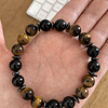 Pulsera masculina creada con Obsidiana negra, Ojo de tigre y anillos de Hematita 1
