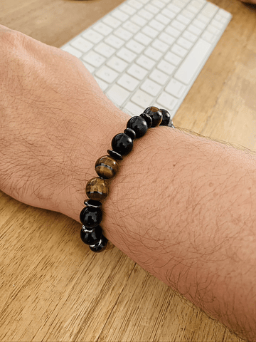 Pulsera masculina creada con Obsidiana negra, Ojo de tigre y anillos de Hematita