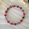 Pulsera creada con piedras chatas de Jade Rosa y Ágatas en tono fucsia 1
