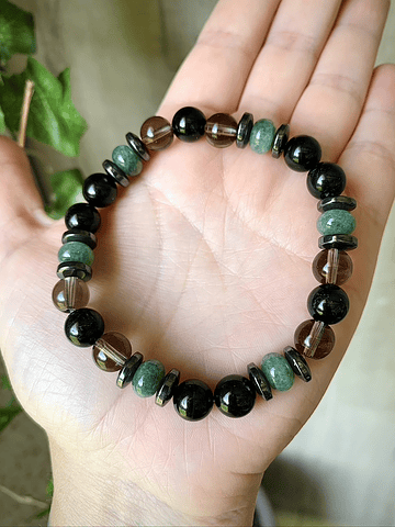 Pulsera masculina creada con Turmalina negra, Cuarzo ahumado, Jade verde y anillos de Hematita