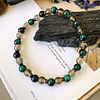 Pulsera masculina creada con Ojo de gato verde, Cuarzo ahumado y anillos de Hematitas. 1