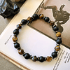 Pulsera unisex creada con Ojo de tigre facetado, Onix y separadores de Hematitas 1