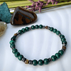 Pulsera unisex creada con Malaquitas, Ojo de tigre facetado y anillos de Hematitas 3