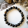 Pulsera masculina de carácter robusto, creada con Ónix negro, Ojo de tigre y Hematitas. 1
