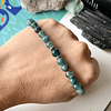 Pulsera masculina creada con Jade azul y Apatitas, con separadores de acero y una Apatita central. 4