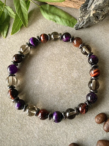 Pulsera masculina creada con Ojo de buey, Cuarzo ahumado, Ojo de gato morado y separadores de Hematitas.