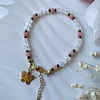 Pulsera femenina creada con Selenitas y Ágatas en tono rosa pastel 1