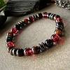 Pulsera masculina creada con Turmalina negra y Turmalina roja, Ojo de Buey y anillos de Hematita 1