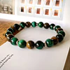 Pulsera unisex creada con piedras de Ojo de tigre y Ojo de gato verde 1