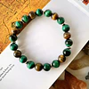 Pulsera unisex creada con piedras de Ojo de tigre y Ojo de gato verde 3