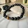 Pulsera masculina con Ónix negro mate, Ojo de tigre y acero 2