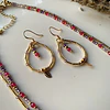 Conjunto de collar doble y aros elaborado con cristales facetados de Rubí rosado y circonitas moradas 5
