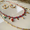 Conjunto de collar doble y aros elaborado con cristales facetados de Rubí rosado y circonitas moradas 3