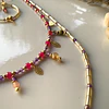 Conjunto de collar doble y aros elaborado con cristales facetados de Rubí rosado y circonitas moradas 4