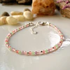Pulsera femenina creada con Jade verde, Cuarzo Rosado, Amatista y Turmalina rosa 2
