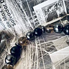 Pulsera masculina creada con Ónix negro, Hematitas, Cuarzo Ahumado y un Ojo de Halcón como piedra central. 3
