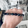 Pulsera masculina creada con Ónix negro, Hematitas, Cuarzo Ahumado y un Ojo de Halcón como piedra central. 4