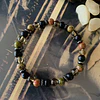 Pulsera unisex creada con Unakita, Ónix negro mate, Cuarzo Ahumado y Hematita. 2