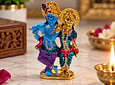 Radha Krishna metálico con piedritas-colores
