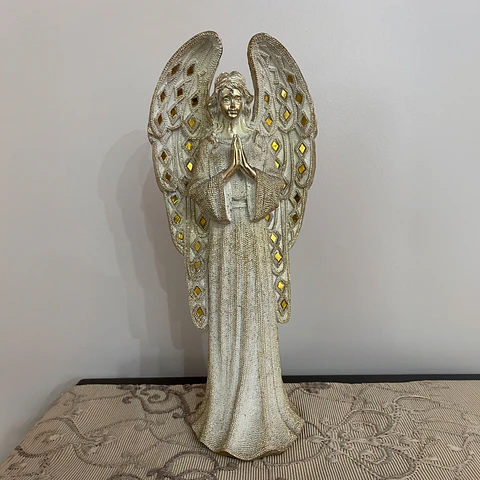 Ángel de la guarda dorado