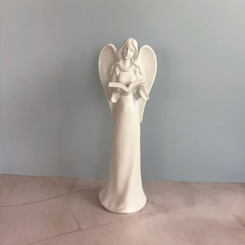 Ángel con libro 1