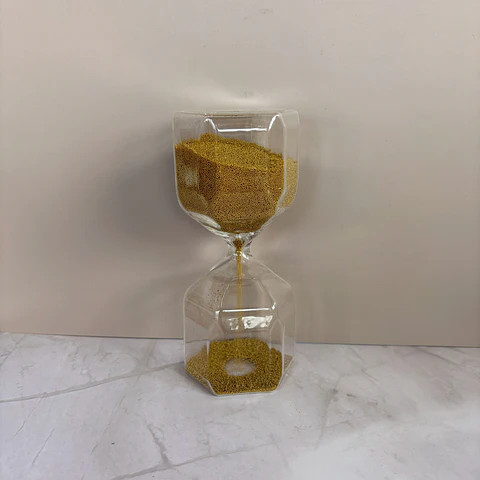 Reloj de arena vidrio dorado granulado 1.5min