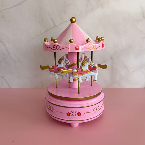 Carrusel rosado con blanco