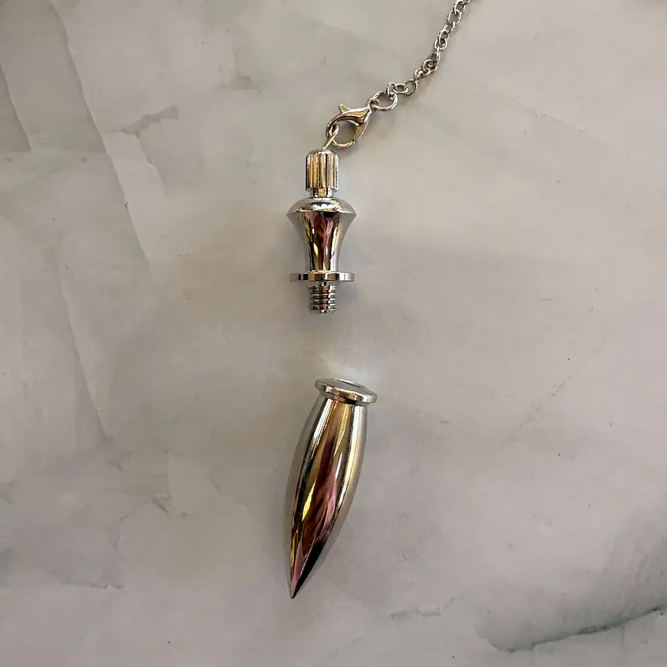Péndulo metalico plateado 2