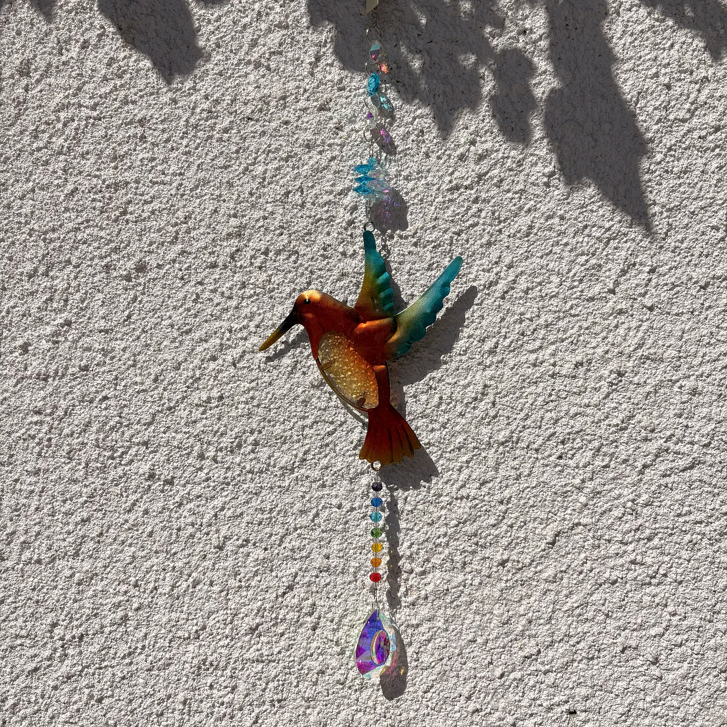 Atrapasoles con colibrí 1