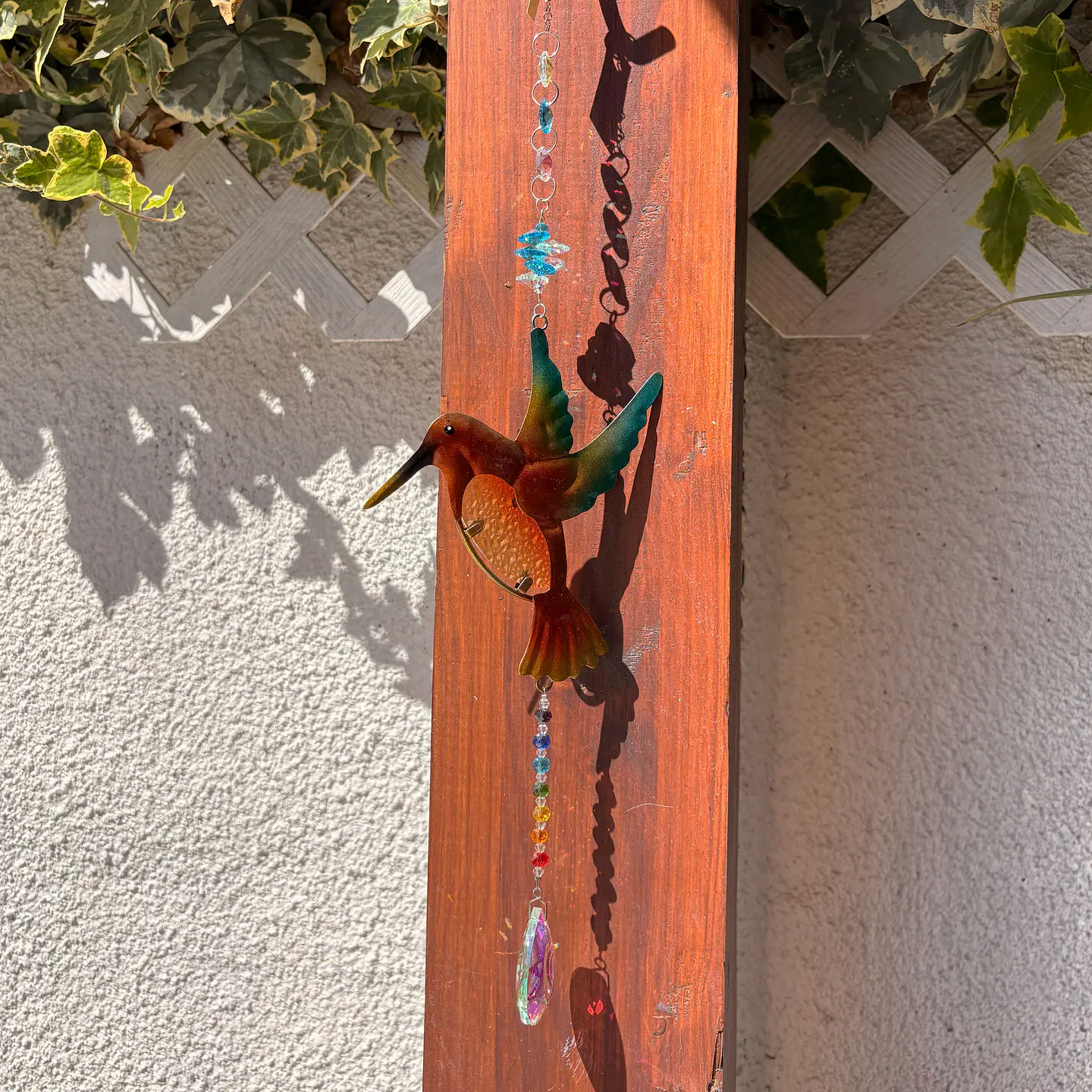 Atrapasoles con colibrí 2