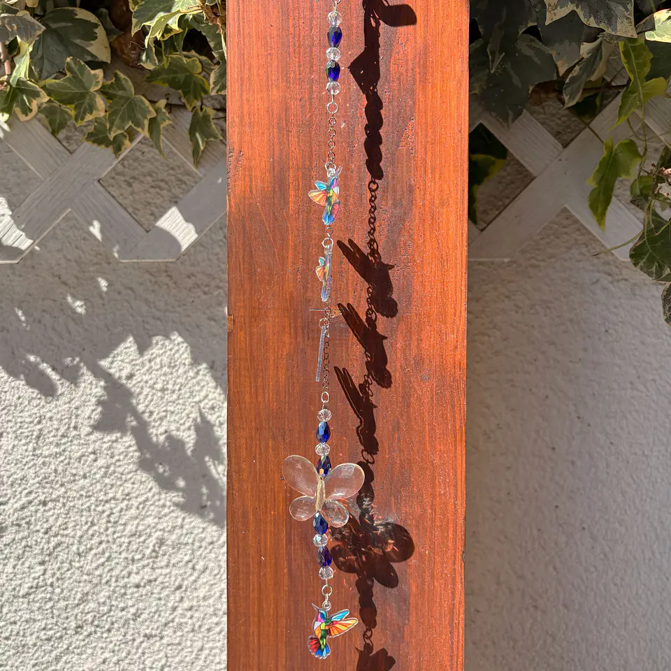 Atrapasoles con colibríes 1
