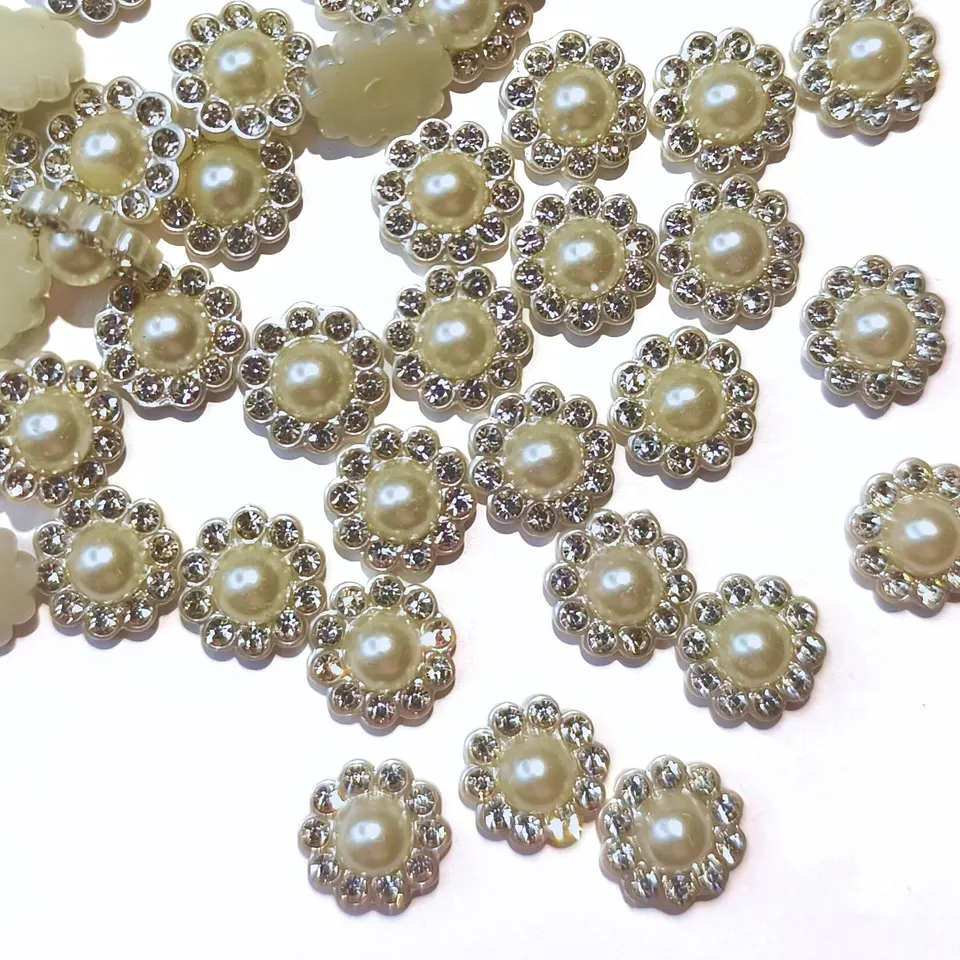 Flores 12 mm. Incluyen remaches. (50 un.) 1
