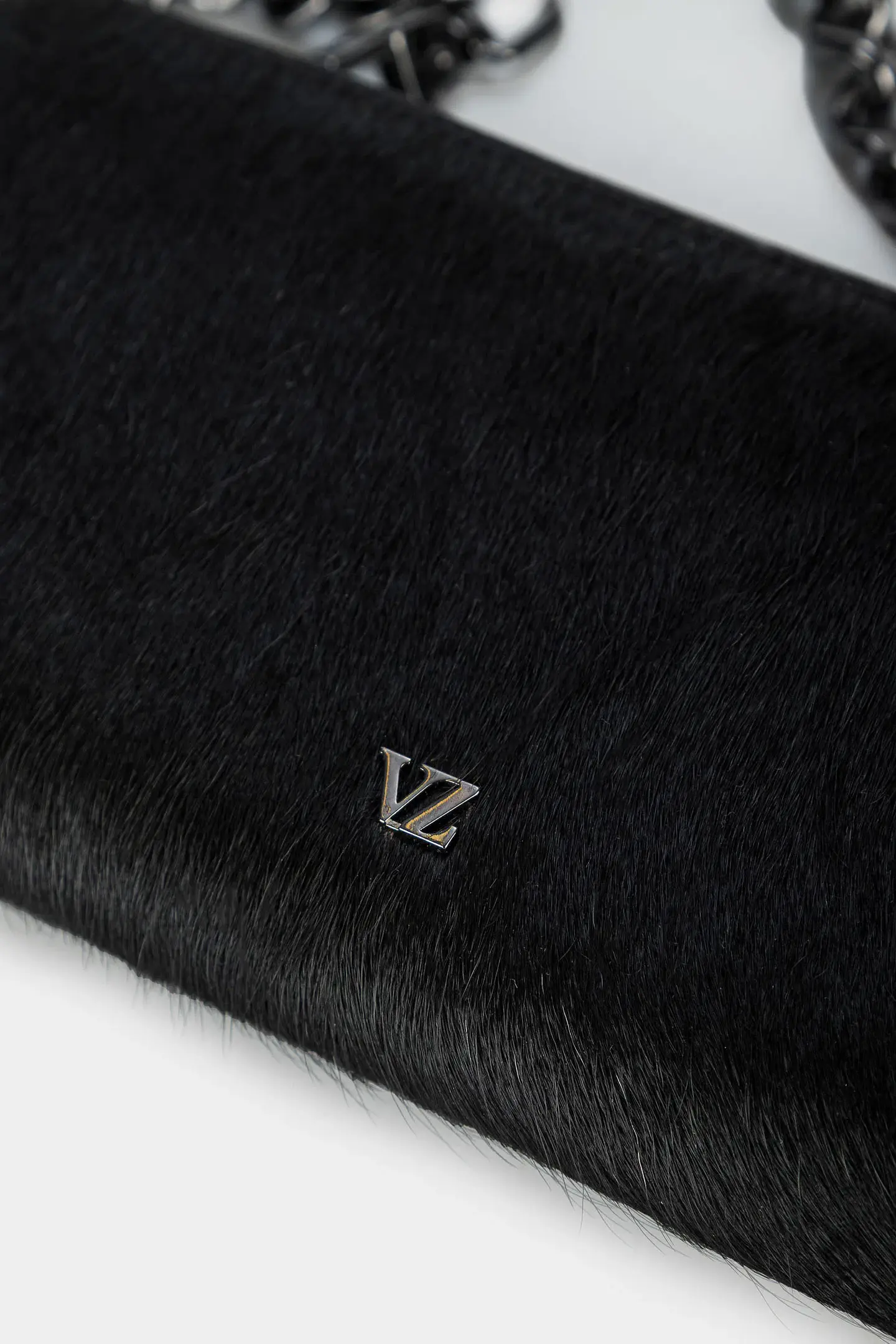 Portachequera Angola Alma 5