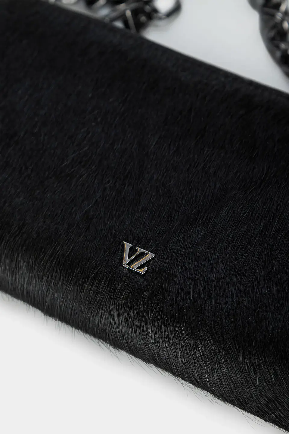 Portachequera Angola Alma 5