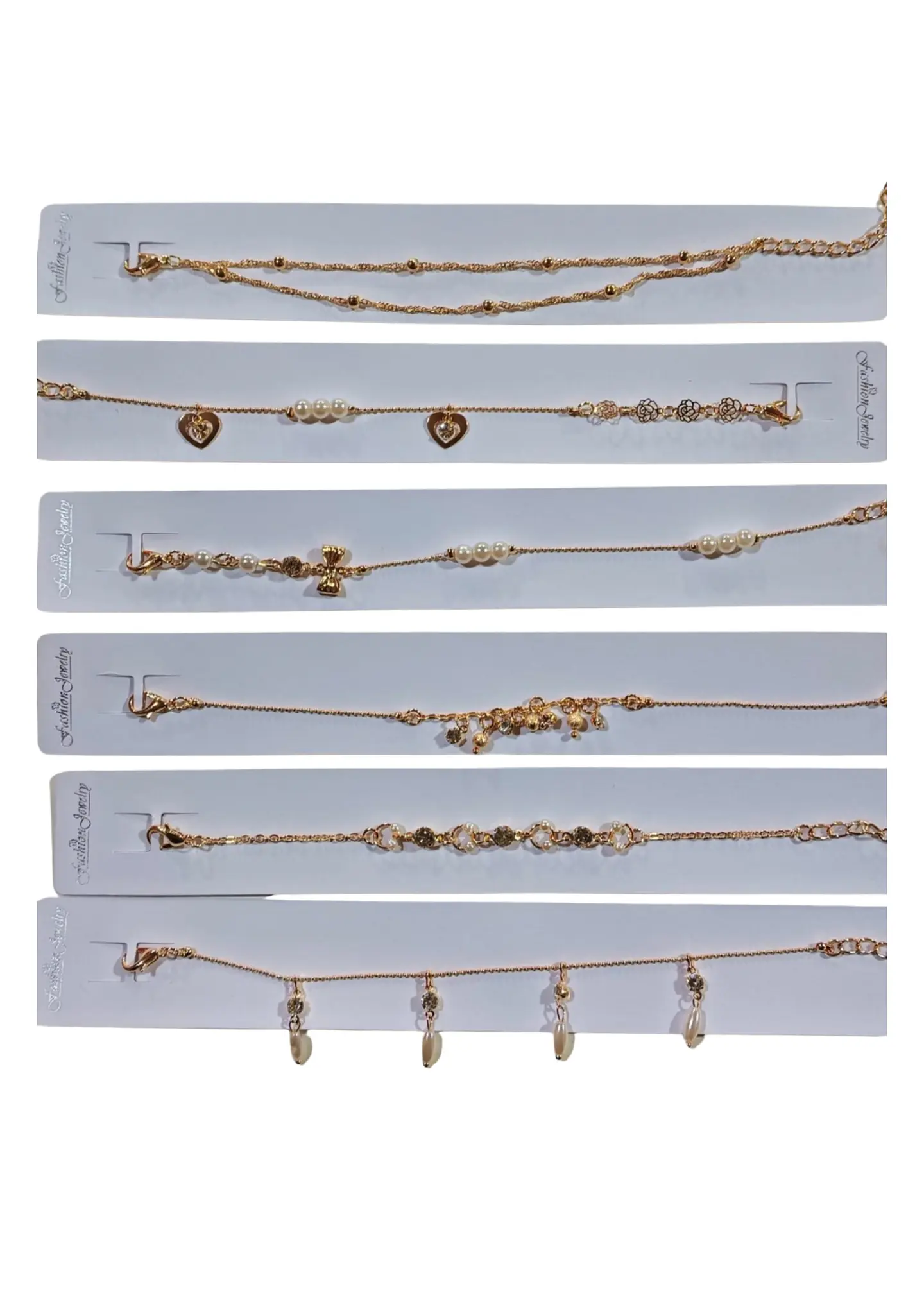 PULSERA DORADA PERLA  Y DIJE 1