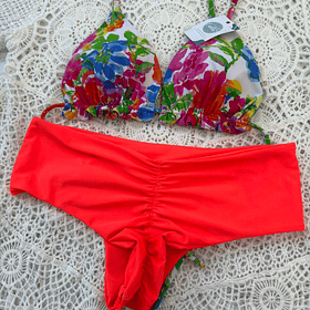 Conjunto ibiza tanga fitness TM flores naranjas